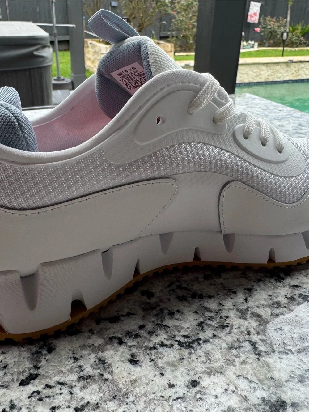 Reebok White and Gray Trail Runner with Orange Logo Accent